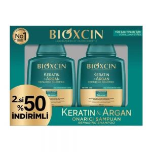 شامپو ترمیم کننده و ضد ریزش موی سر Bioxcin مدل Keratin And Argan حجم 600 میل